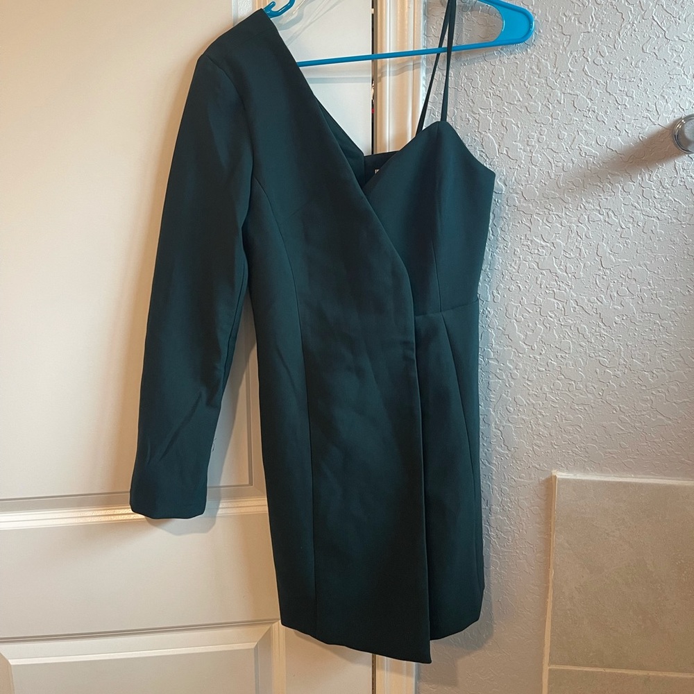 Dark green one sleeved mini dress.